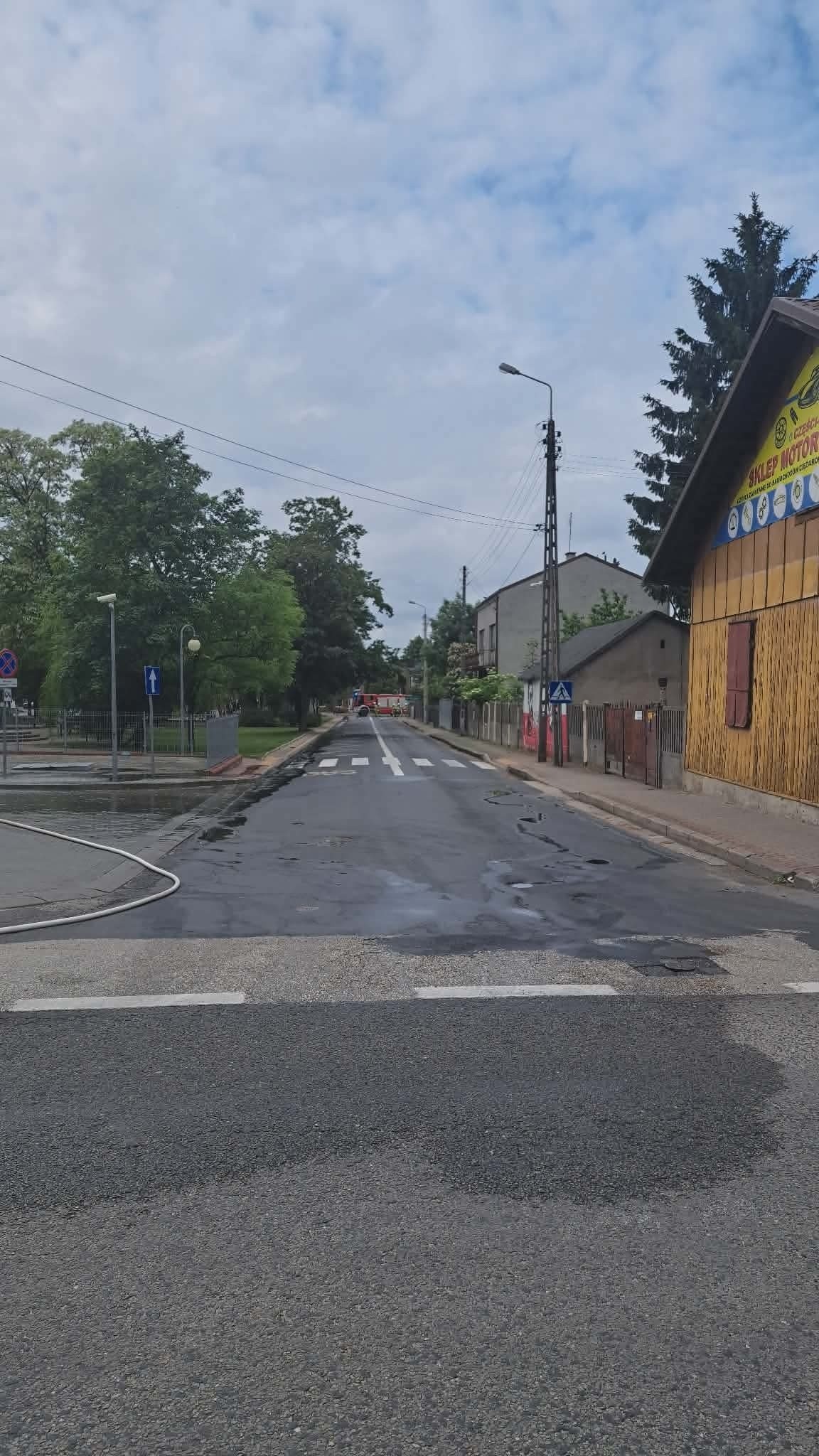 Fire hoses deployed at a fuel station in Mszczonów